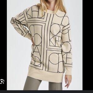 Soaked Tunic Sweater